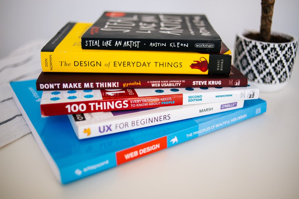 Photo of UX/UI Design Books, courtesy of Elena Putina